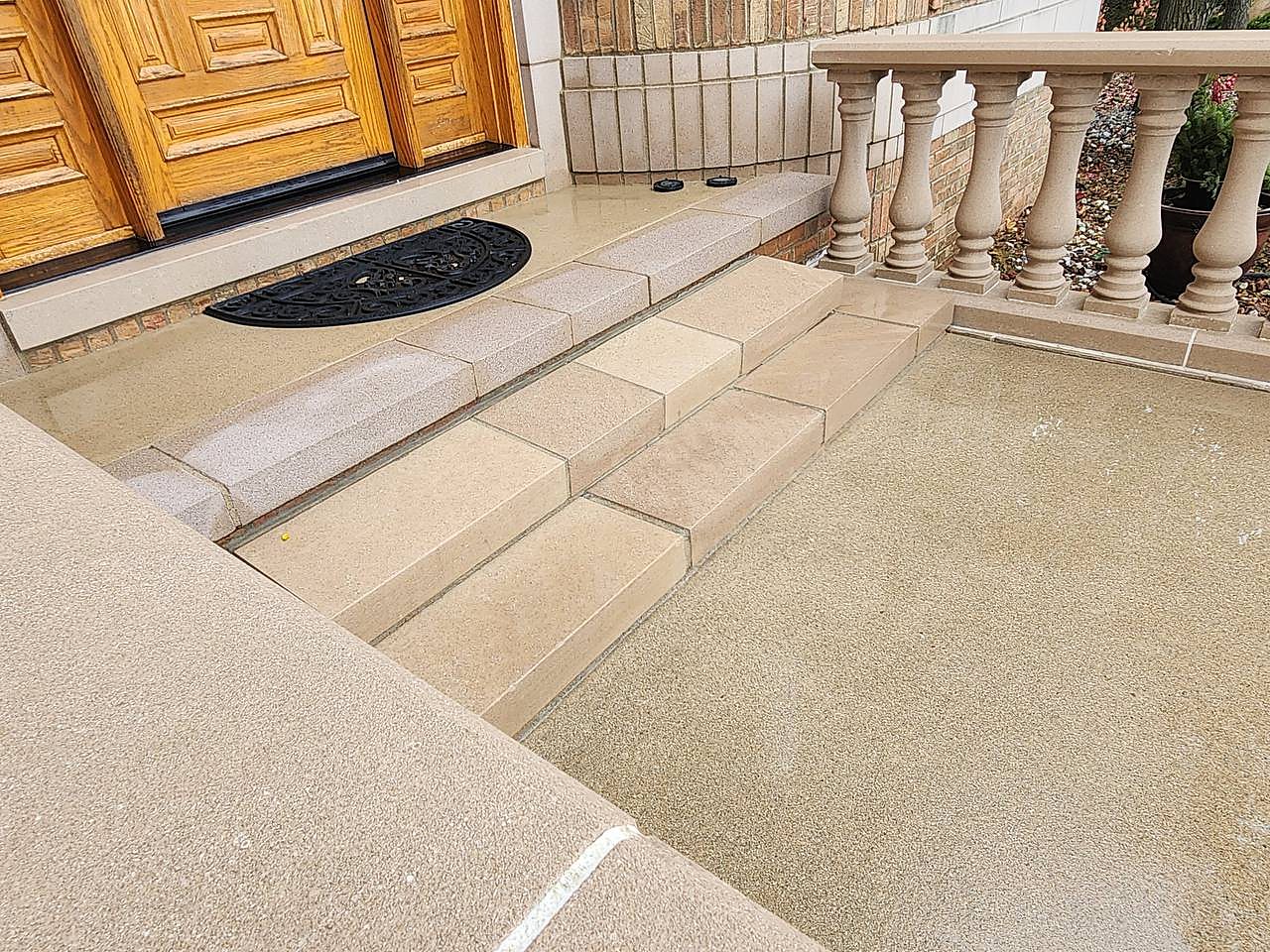 Front steps and stone balustrade cleaned bright