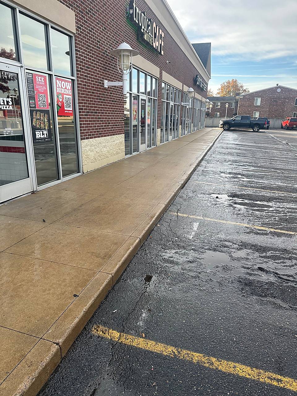 Smoothie shop sidewalk cleaned by Are You Washed