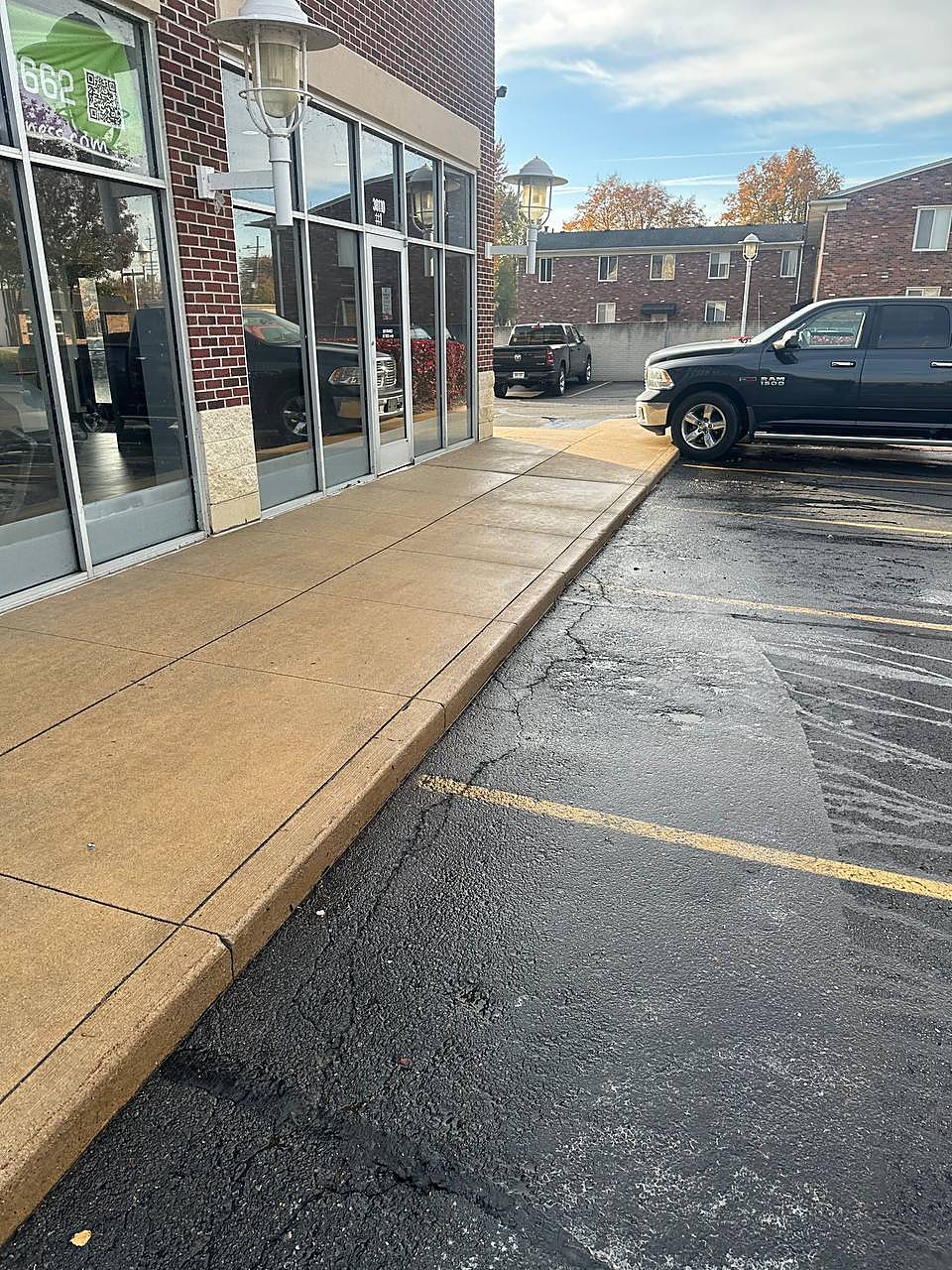 Commercial storefront walkway pressure washed in Metro Detroit