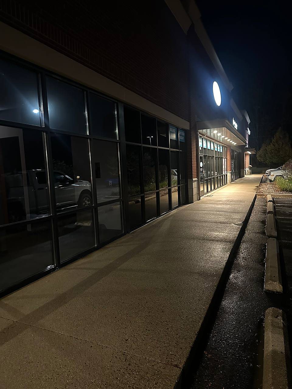 Commercial walkway pressure washed during overnight service