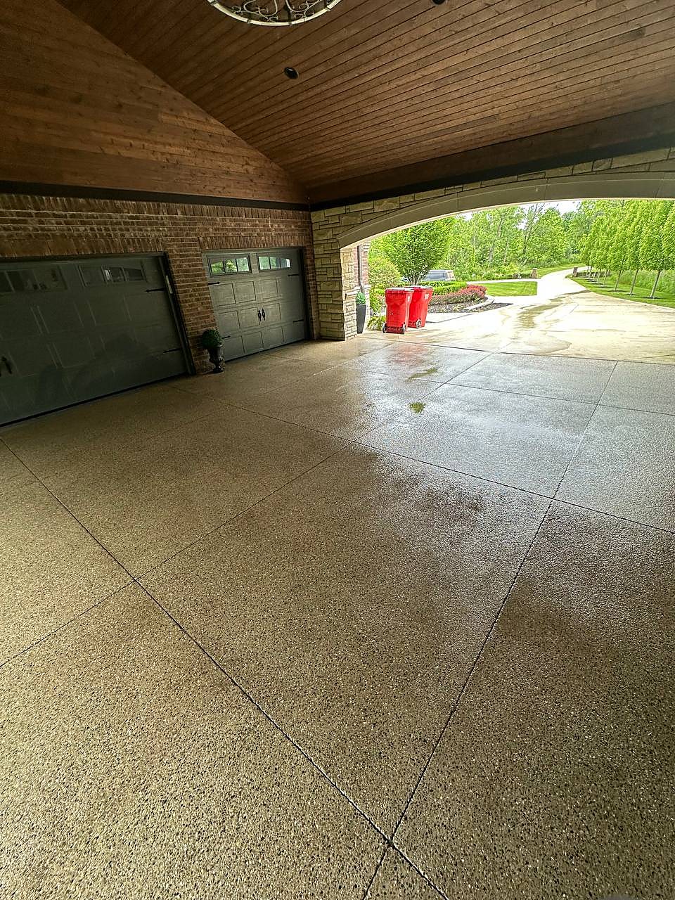 Exposed aggregate breezeway concrete cleaned at a Macomb County home
