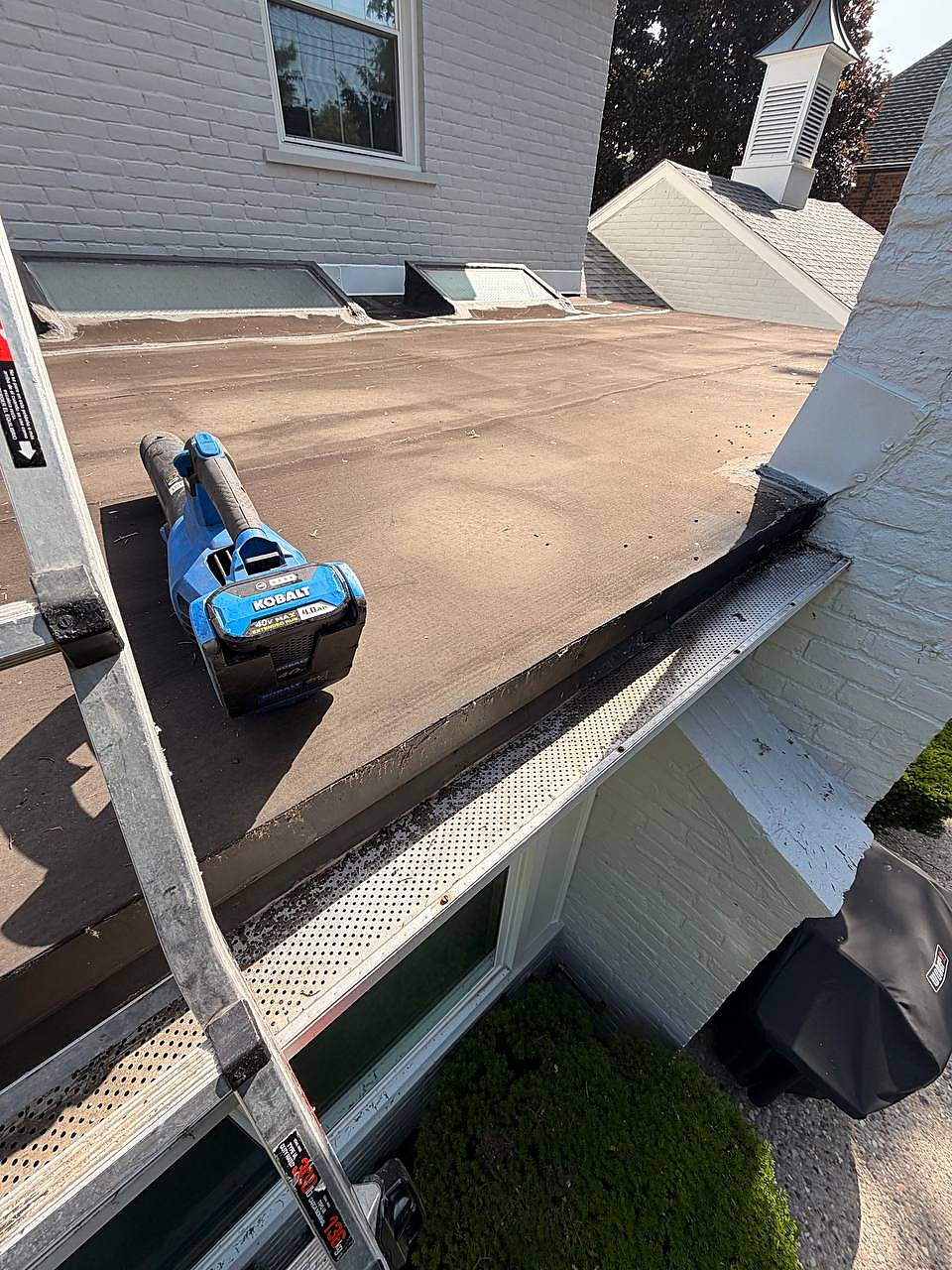 Gutters being cleared and blown out in Macomb, MI