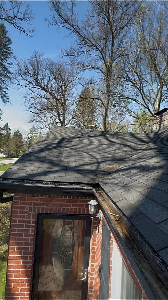 Roof valley and gutter cleared over the front entry after cleanout