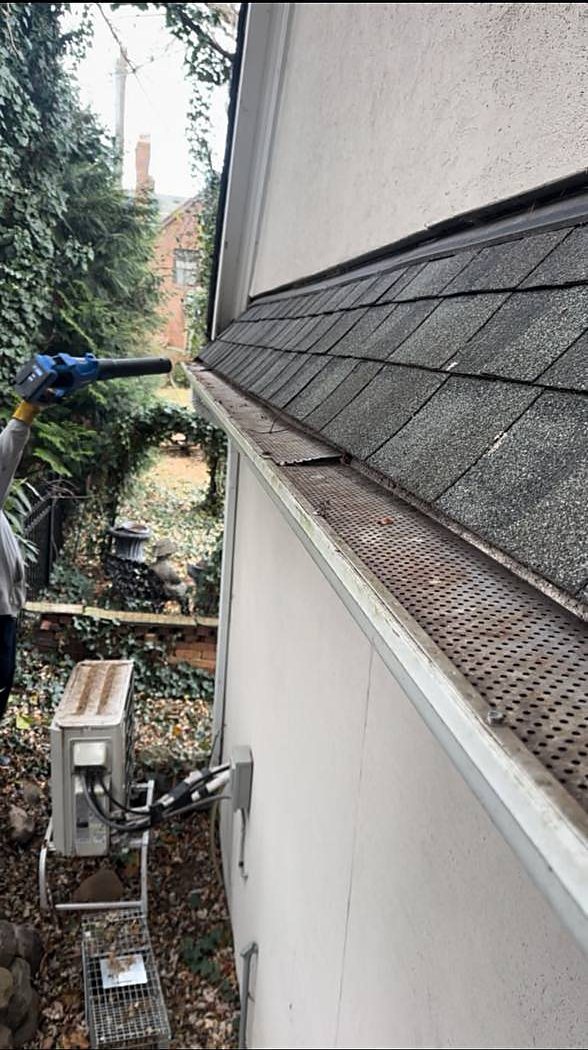 Gutter guard blown clear of pine needles after cleaning