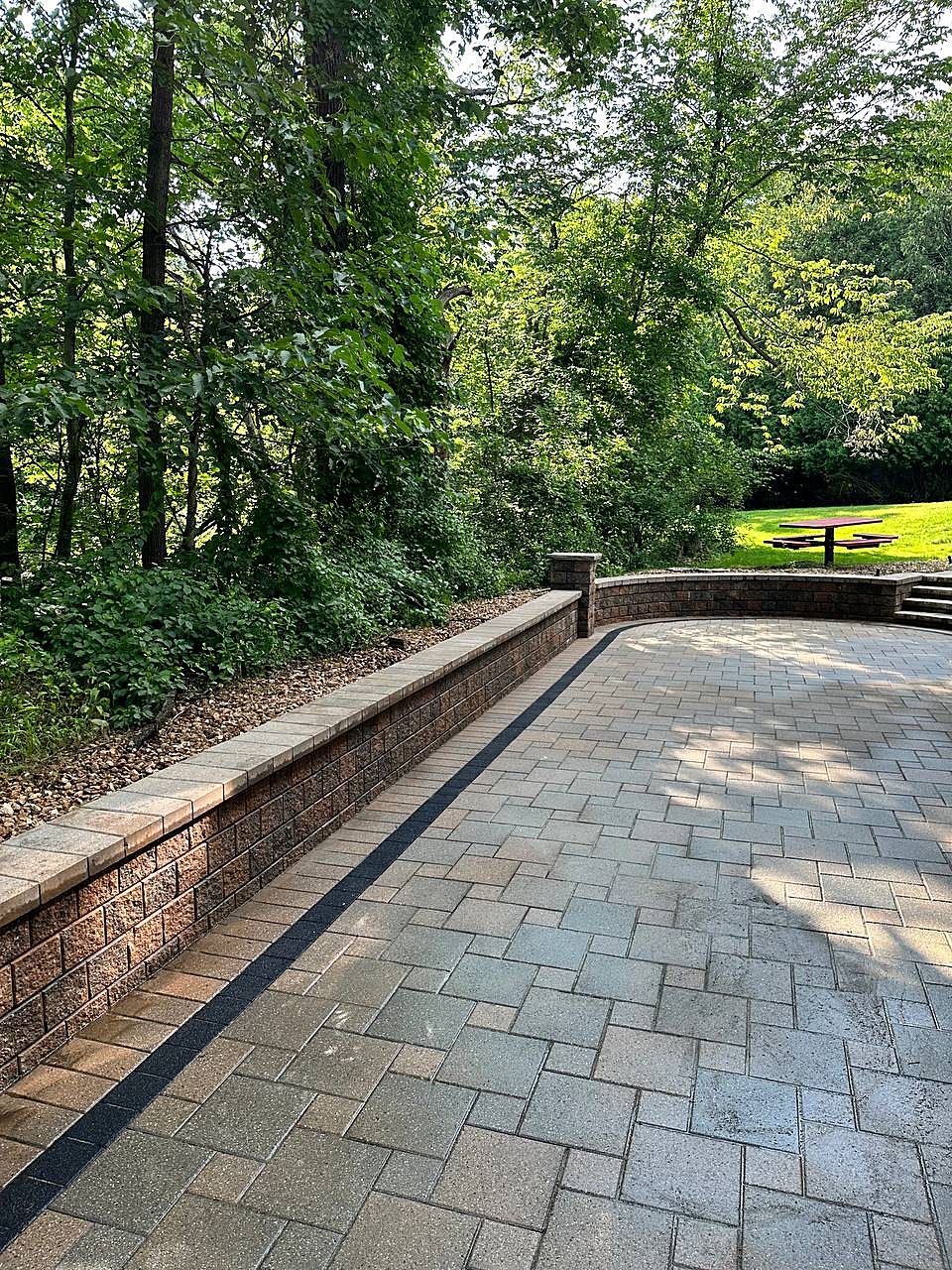 Paver patio and garden wall pressure washed in Metro Detroit
