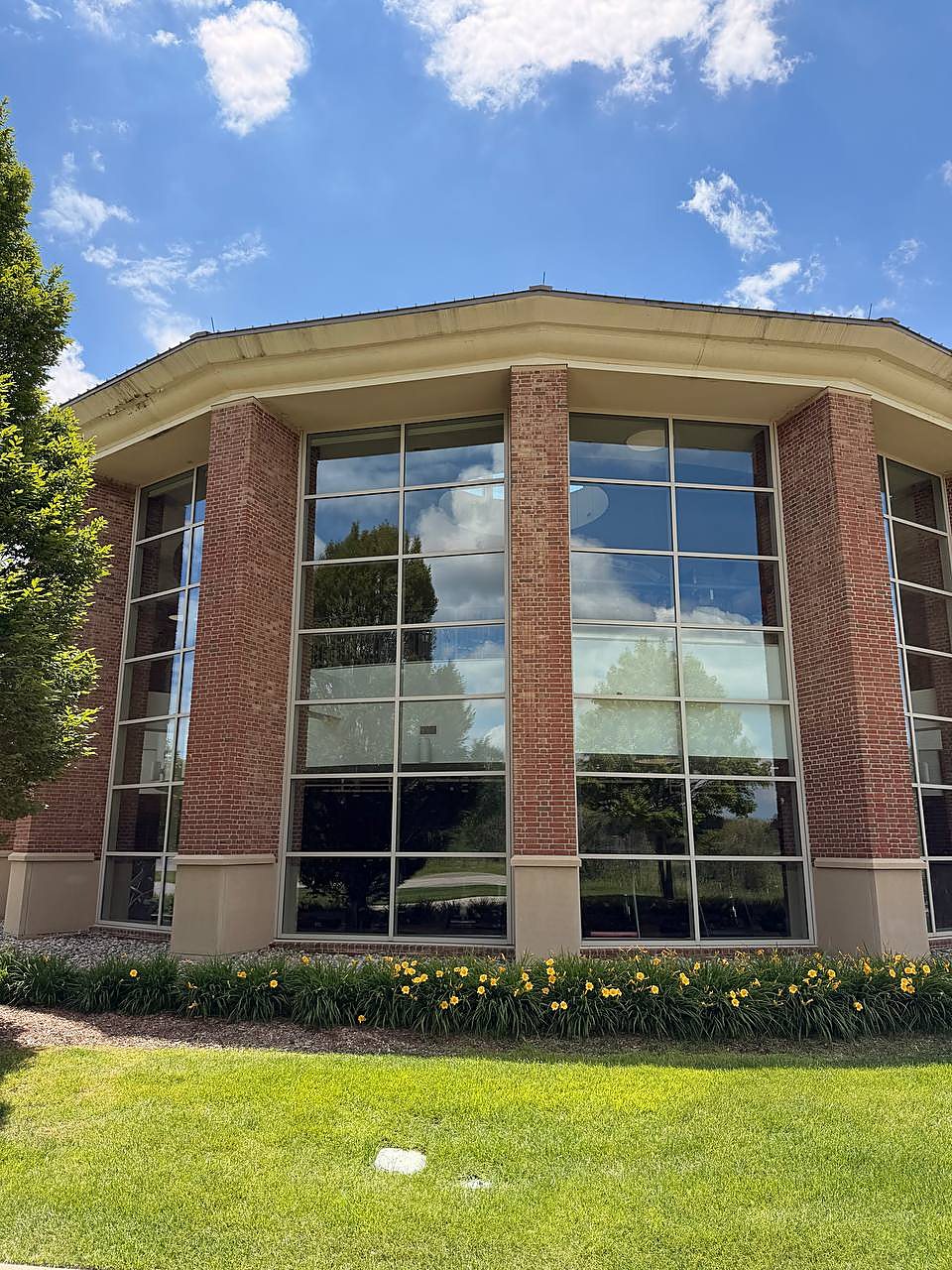 Commercial glass curtain wall cleaned in Macomb County