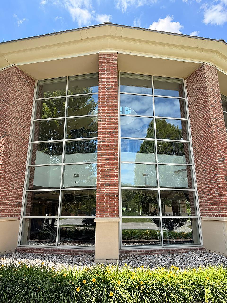 Two story commercial windows cleaned streak free in Metro Detroit
