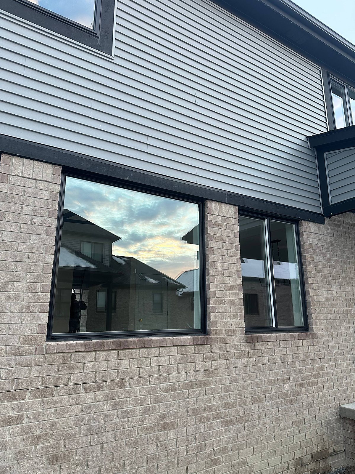 Exterior windows cleaned on a brick home in Macomb, MI